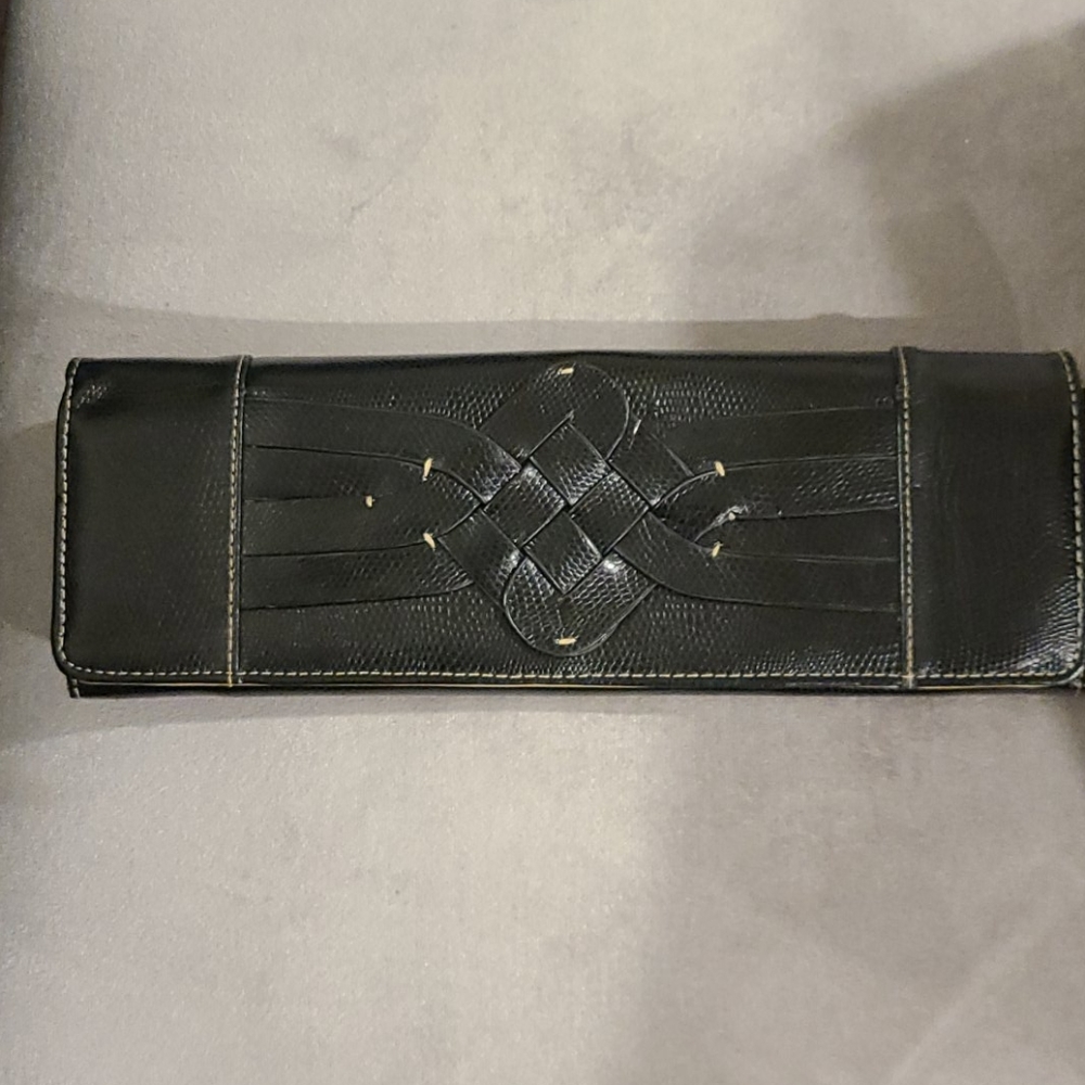 Rolfs black and cream clutch